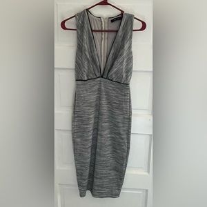 Grey sheath. Size s.  Never worn.